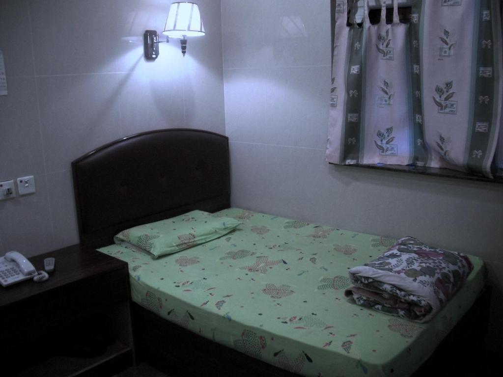 Kowloon Youth Village Tsim Sha Tsui 九龙青年公寓 Hongkong Rum bild